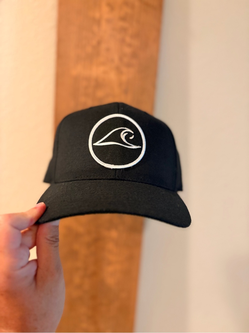Black Cap with White Wave Logo